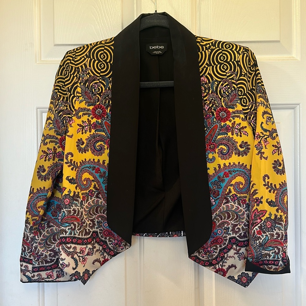 BEBE multi colored blazer, perfect condition never worn